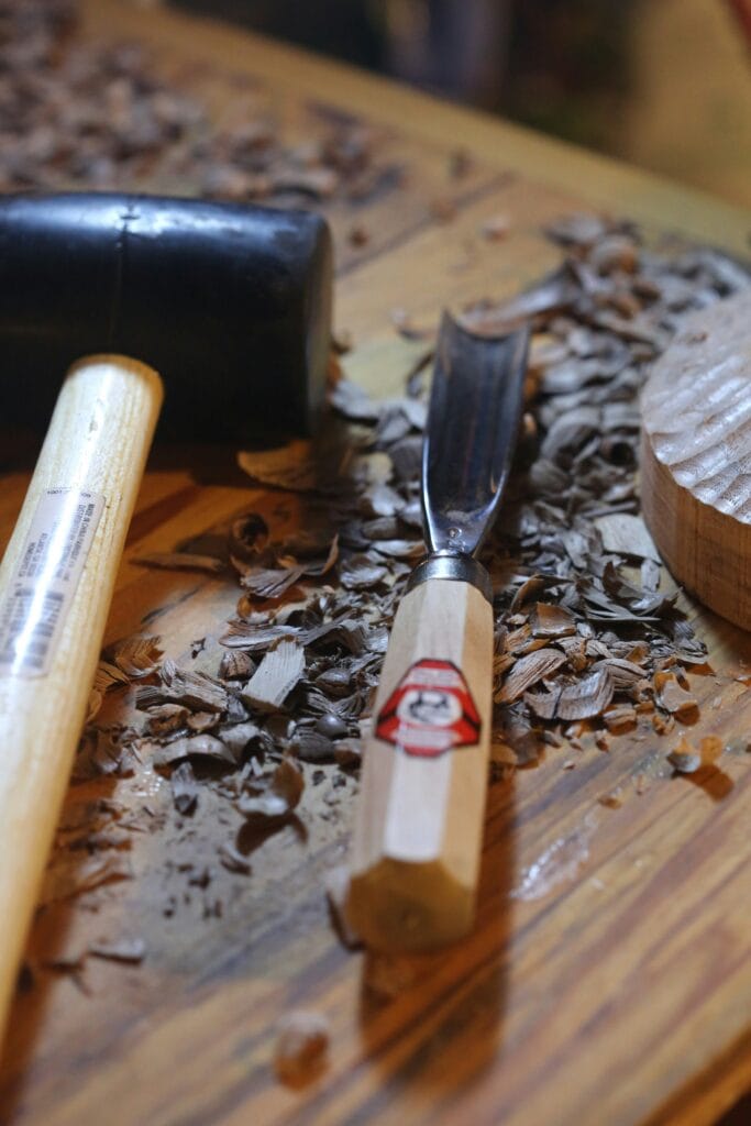 Woodworking Tools With Samples Of Oak, Walnut, And Maple